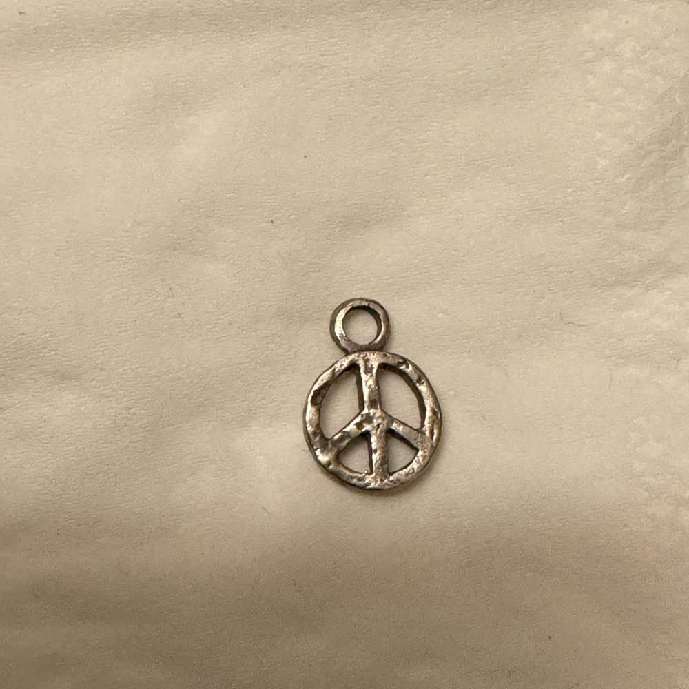 Lee Brevard tiny peace earring